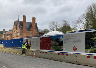 Building hoardings being set up at the Norham St Edmund site